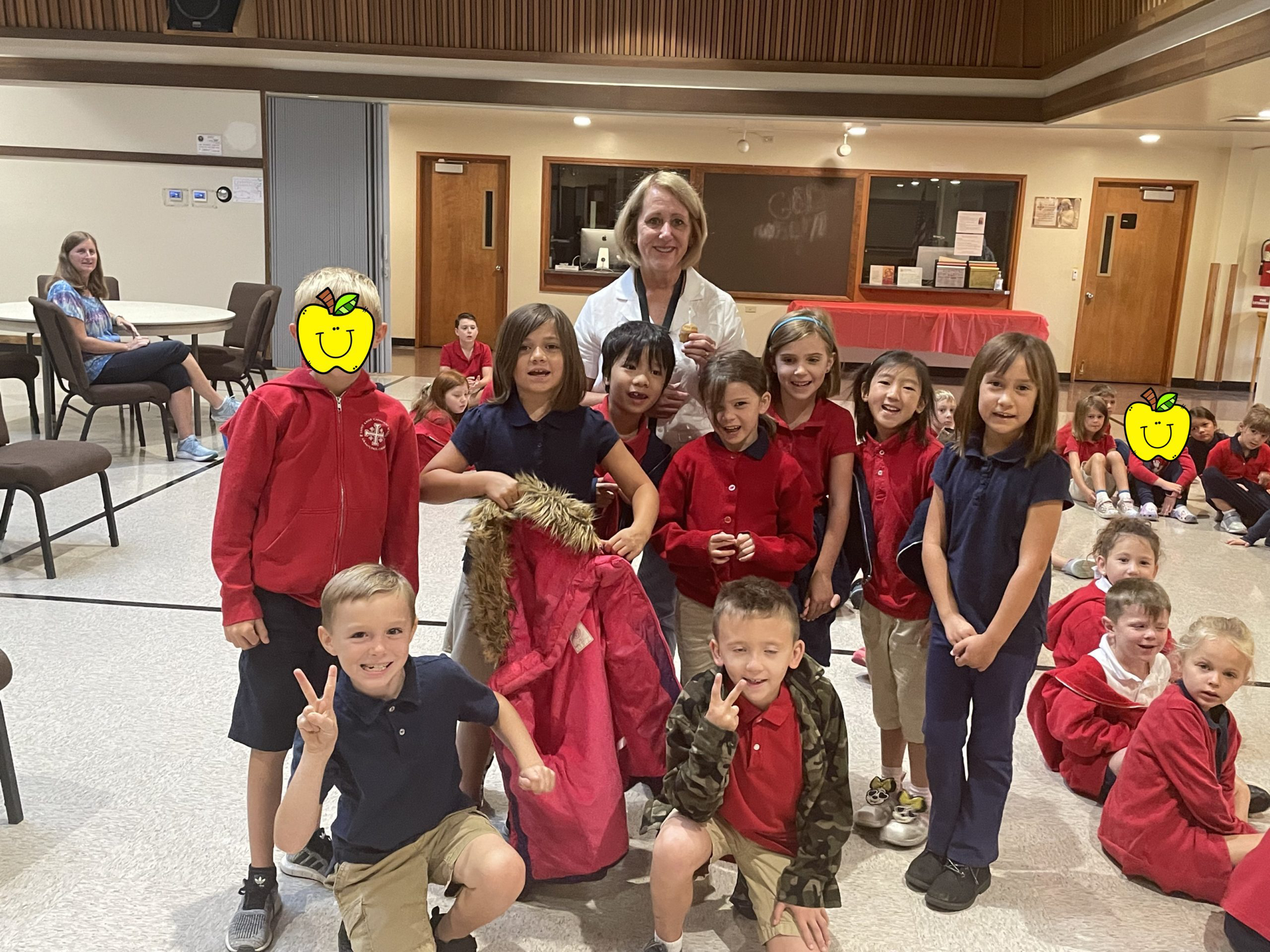 A group photo of K-8 students and teachers from St. Anne Catholic School